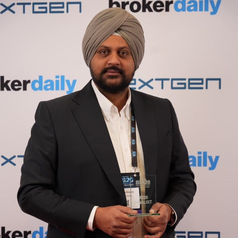 Hem Raj Kasana, Founder & Director of Kasana Finance, holding his Broker Innovation Awards 2026 finalist trophy