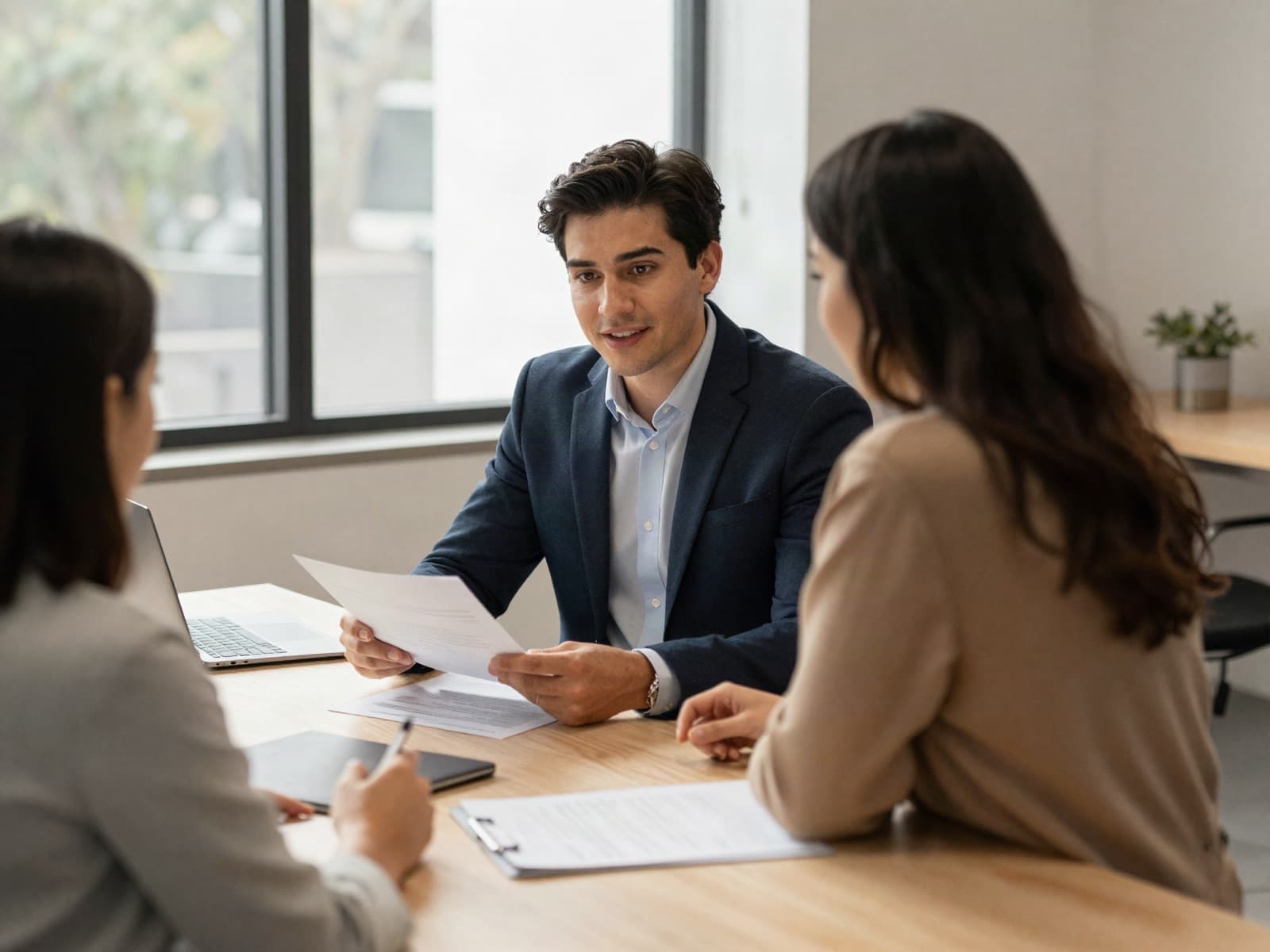 A broker walking a client through their application